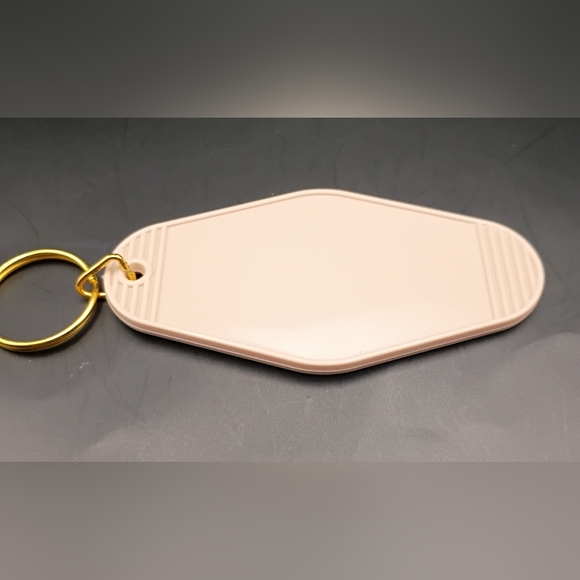 Stylish Cream Keychain with Cow Design - Picture 2 of 2